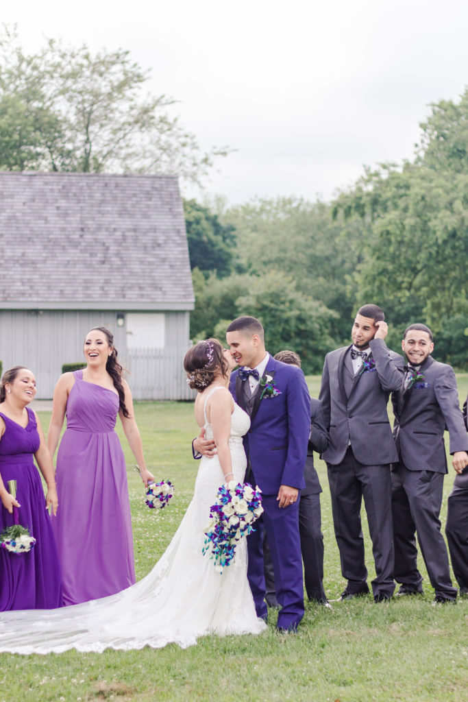 bridal party, bride and groom, purple bridesmaid dresses, grey groomsmen suits, blue grooms suit, mr and mrs