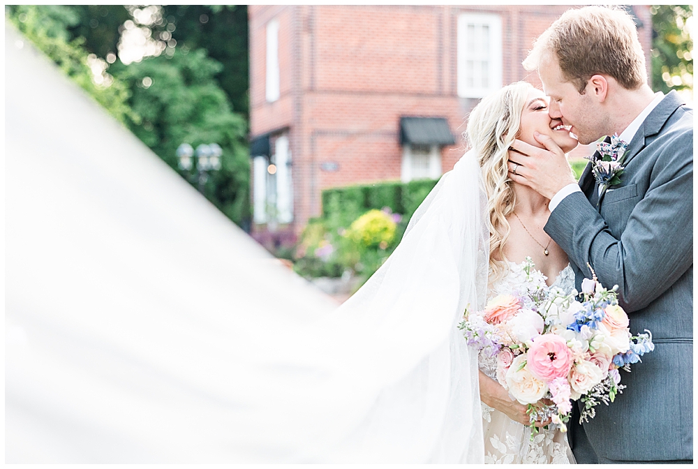 Bride and groom portrait with long veil at summer Historic Mankin Mansion wedding in June | Richmond wedding photographer
