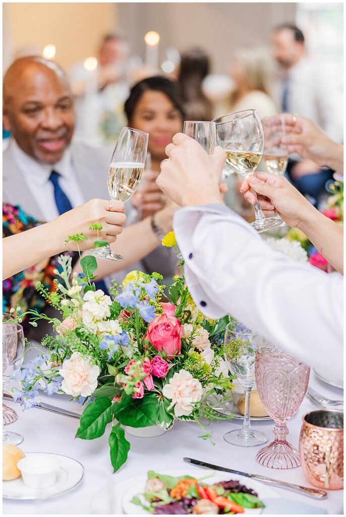 Indoor reception setup for spring pastel wedding | Wedding toast ideas | Virginia Estate Wedding Venues | Northern VA Wedding Photographer