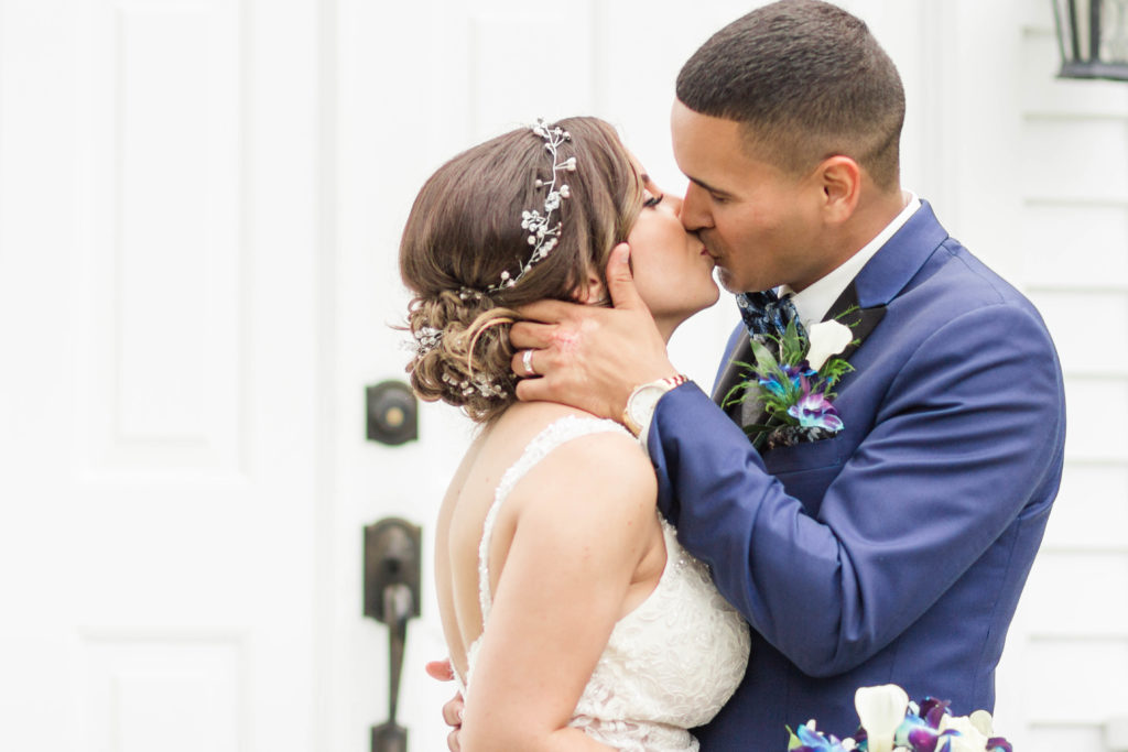 kiss, bride and groom, mr. and mrs., you may kiss your bride, first kiss, church, chapel, long island wedding, married, marriage, wedding day, wedding dress, blue suit, boutonniere, wedding hair, brides hair, wedding updo, bridal updo