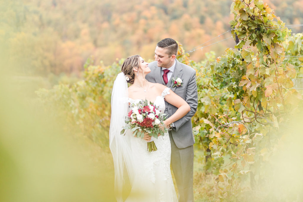 breaux vineyard, winery, grapes, vines, bride and groom portrait, fall leaves, autumn wedding, fall wedding