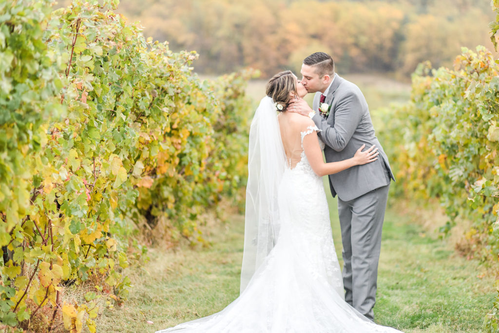 breaux vineyard, winery, grapes, vines, bride and groom portrait, fall leaves, autumn wedding, fall wedding