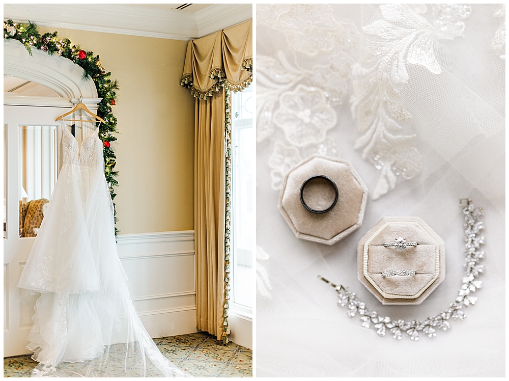 Wedding dress hanging on a white door near a window. Christmas garland around the door frame. 

A champagne velvet ring box holding a solitaire diamond ring with a twisted, white gold diamond wedding band. A dark, black men's wedding band. Lace veil flat-lay. A crystal bracelet.