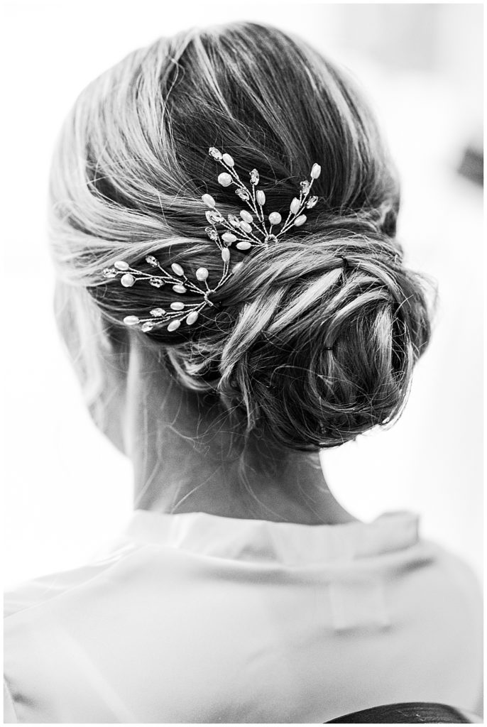 Wedding hair updo with crystal and pearl hair pins. Wedding hair for blonde hair.
