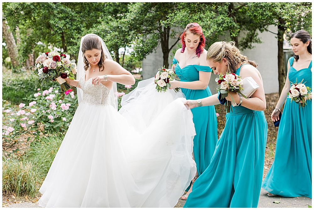 Teal bridesmaid dresses with roses