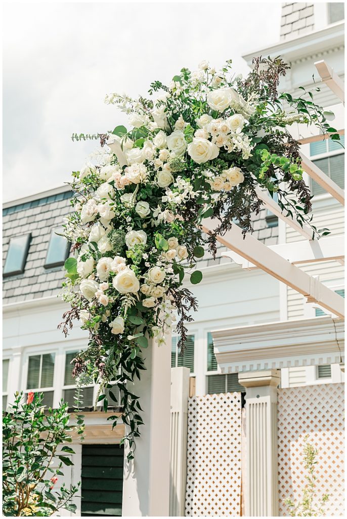 The Rectory on Princess Street wedding venue Old Town Alexandria Wedding photographer floral arrangements for arbor