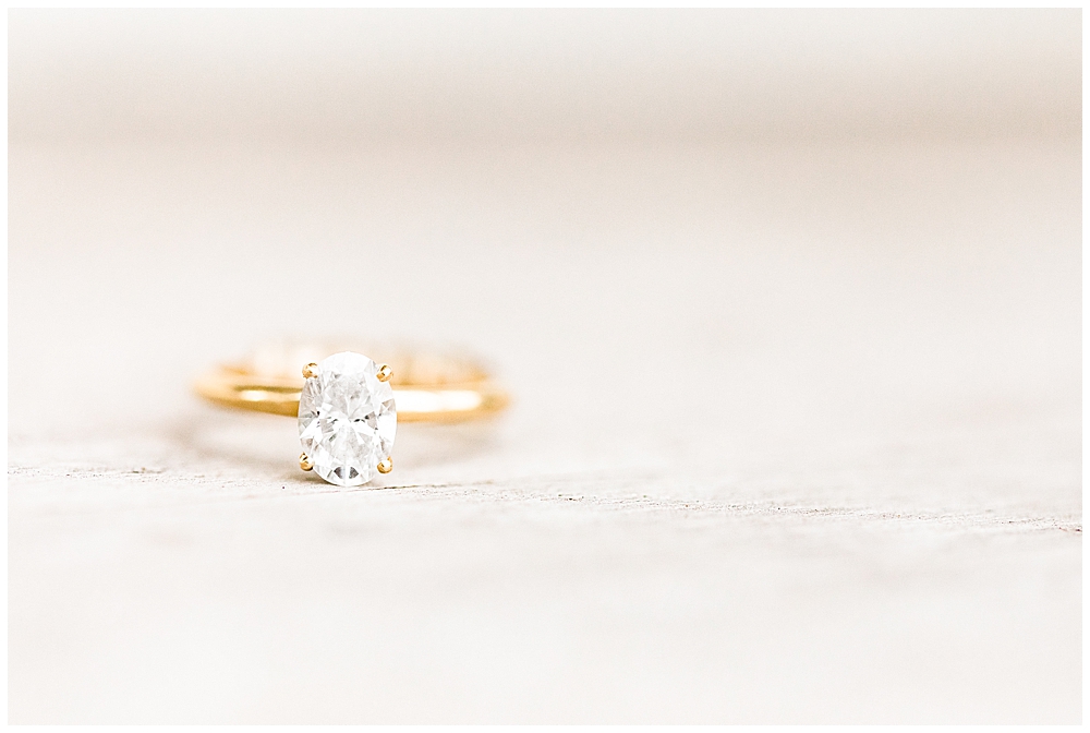 Oval solitaire diamond engagement ring with gold band | engagement ring | oval engagement ring | engagement session inspo | engagement photo inspo | Maryland wedding photographer | destination wedding photographer