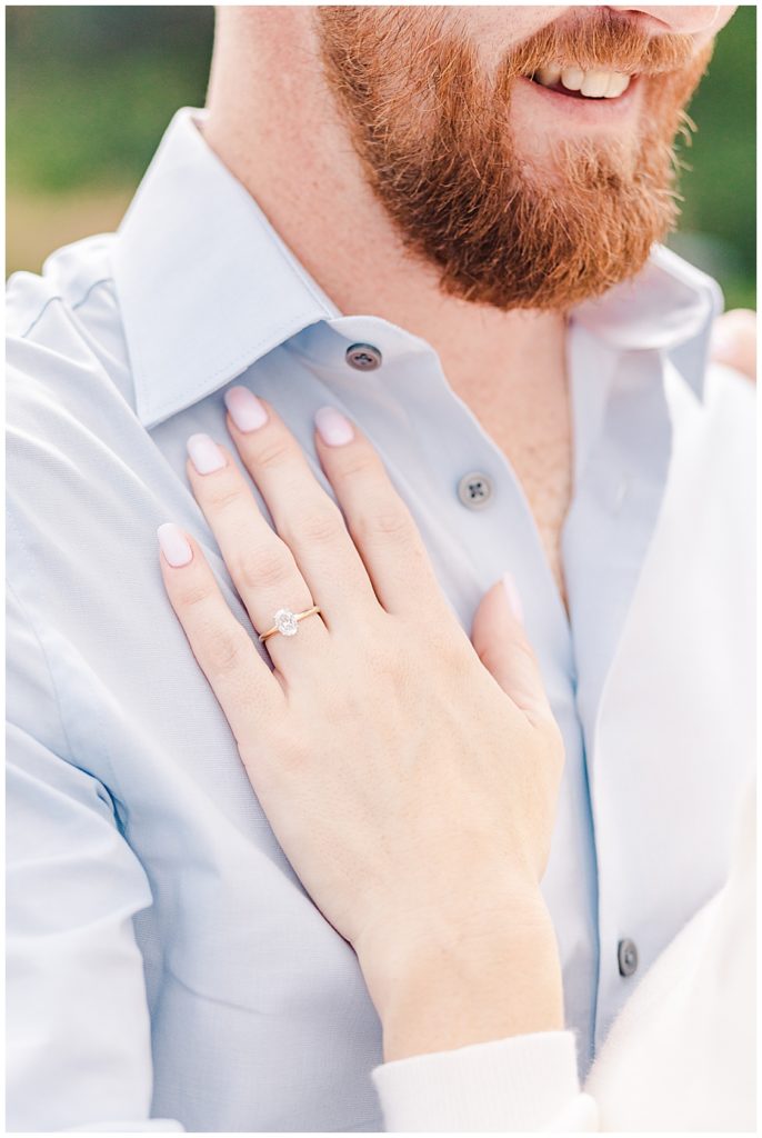 Oval solitaire diamond engagement ring with gold band | engagement ring | oval engagement ring | engagement session inspo | engagement photo inspo | Maryland wedding photographer | destination wedding photographer