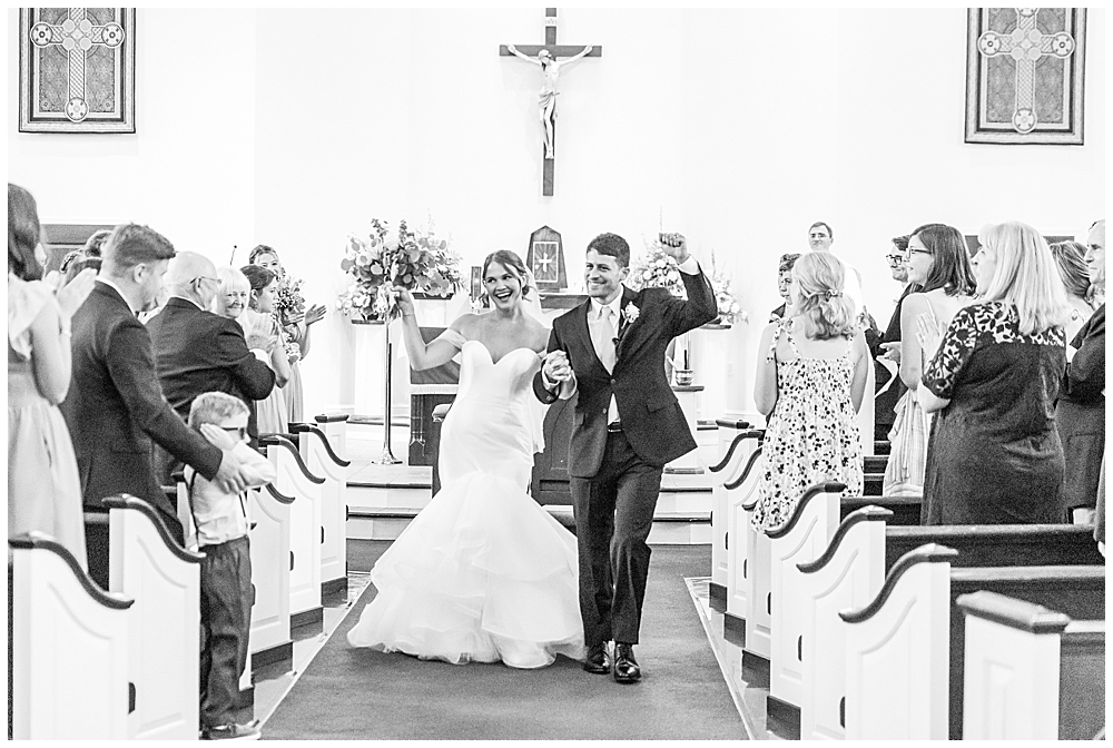 St. Bridget of Ireland Church wedding ceremony by Loudon County wedding photographer.