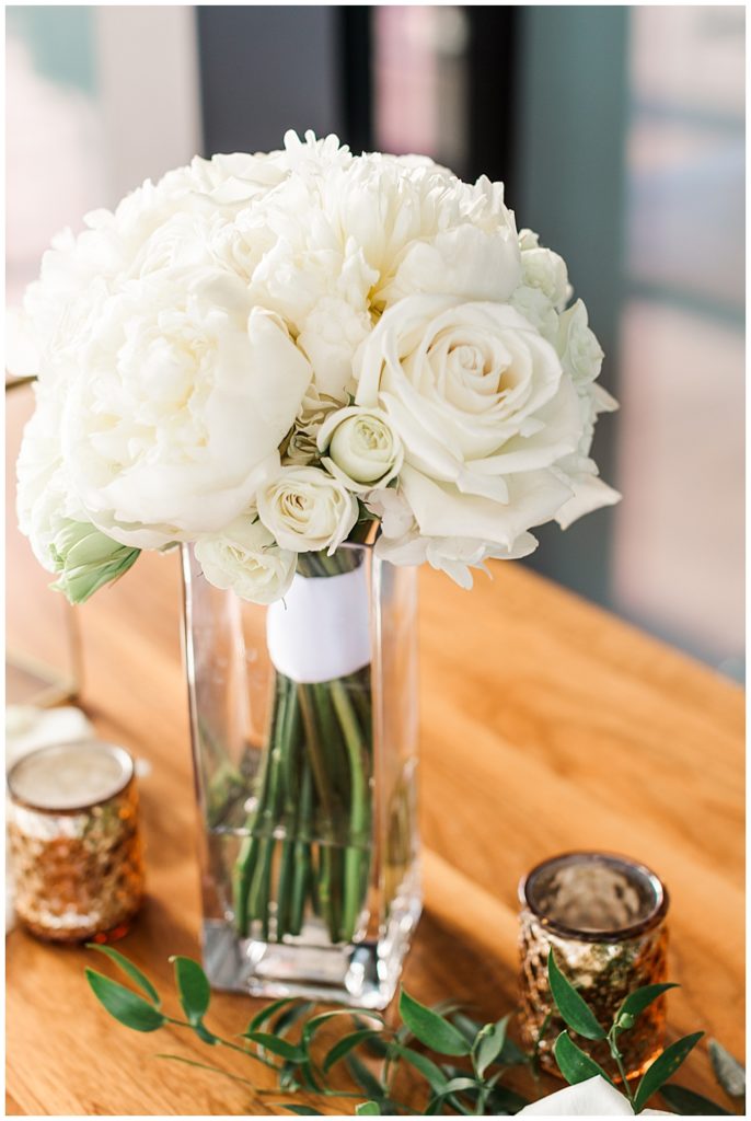 All white bride's bouquet at a Washington, D.C. wedding at District Winery.