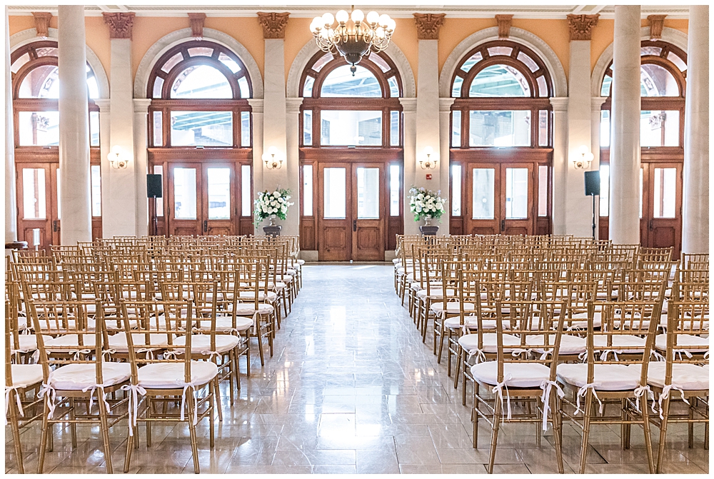 Richmond is a beautiful place to get married. John and Lindsey set up gold chairs to compliment the ornate gold moulding of Main Street Station's lobby. The grand front doors with glass windows provided a beautifully lit backdrop as they said their vows.

I'm Emily, a Northern VA and Richmond wedding photographer based in Vienna, VA near Washington, D.C. If you're looking for a wedding photographer who will help you craft a custom wedding day timeline, take great care to capture every memory as it happens, and hype you up with easy posing prompts, visit my website to inquire!