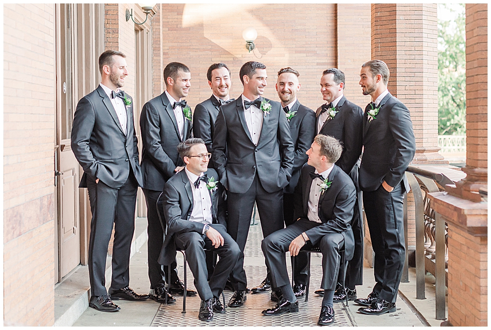 John and Lindsey's modern wedding ceremony was so beautiful, with their groomsmen dressed in satin-lapel tuxedos and bridesmaids in mismatched dusty blue crepe bridesmaid dresses. They said "I do" in downtown Richmond, VA.

I'm Emily, a Northern VA and Richmond wedding photographer based in Vienna, VA near Washington, D.C. If you're looking for a wedding photographer who will help you craft a custom wedding day timeline, take great care to capture every memory as it happens, and hype you up with easy posing prompts, visit my website to inquire!