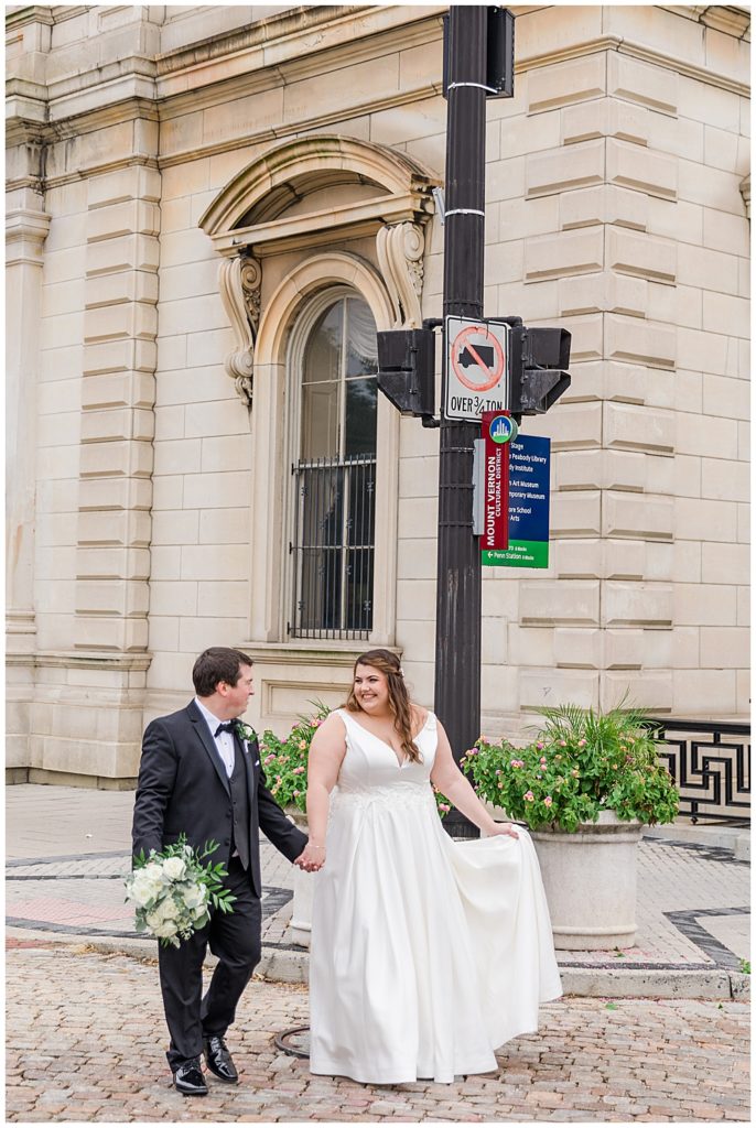 George Peabody Library wedding photos outside one of the best wedding venues in Baltimore, MD. Taken by a DMV Wedding Photographer.