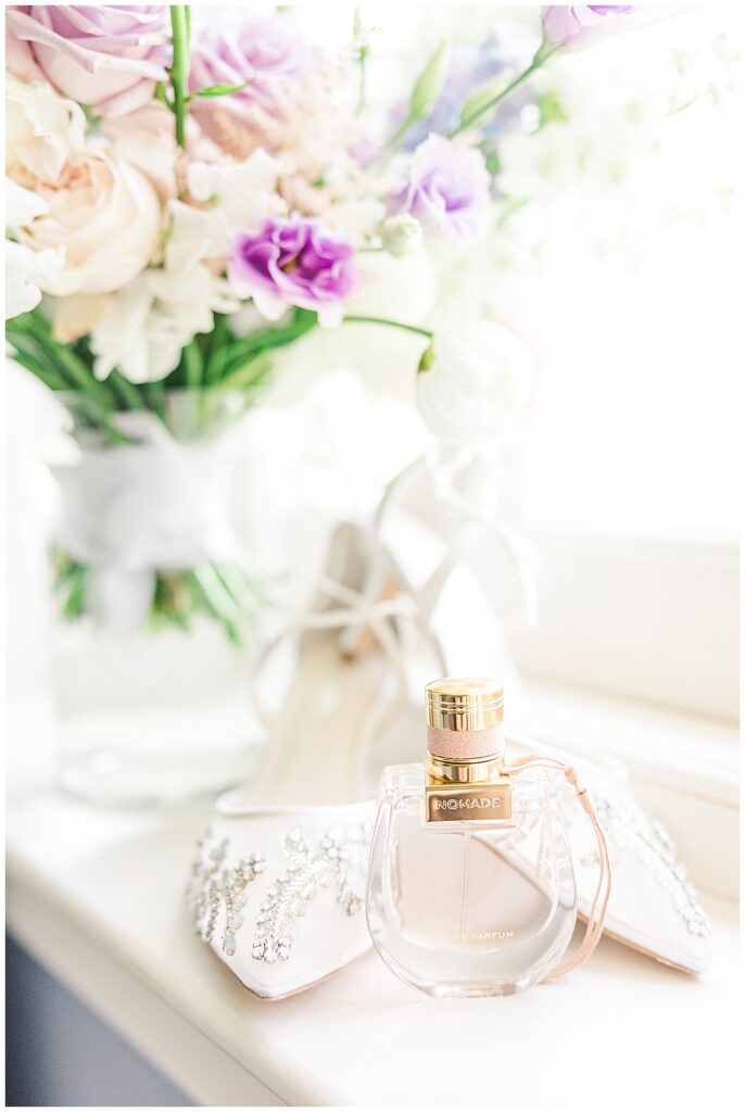Bridal perfume for wedding details. Best perfume for your wedding day. Nomade perfume and fragrance with Bella Belle lace up heels and pretty bridal beading.