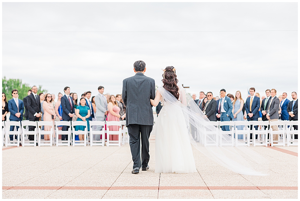 Bride and father walk down the aisle at Congressional Country Club wedding ceremony in Bethesda, MD | DMV Wedding Photographer