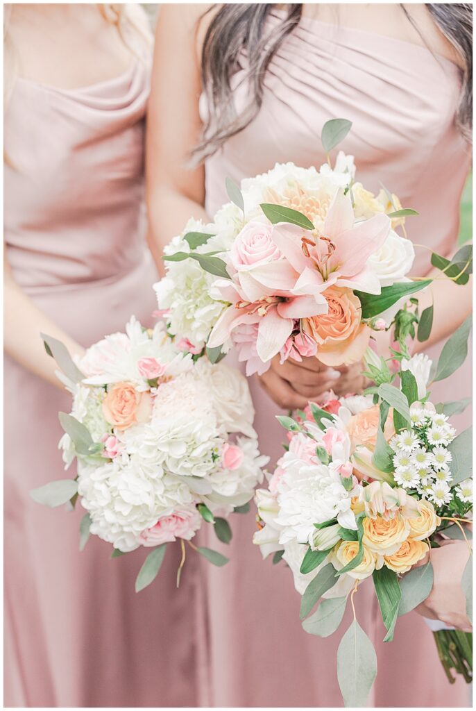 Spring satin pink bridesmaid dresses | pastel peach and pink bridesmaid bouquets | Evergreen Country Club Wedding | Northern VA Wedding Photographer