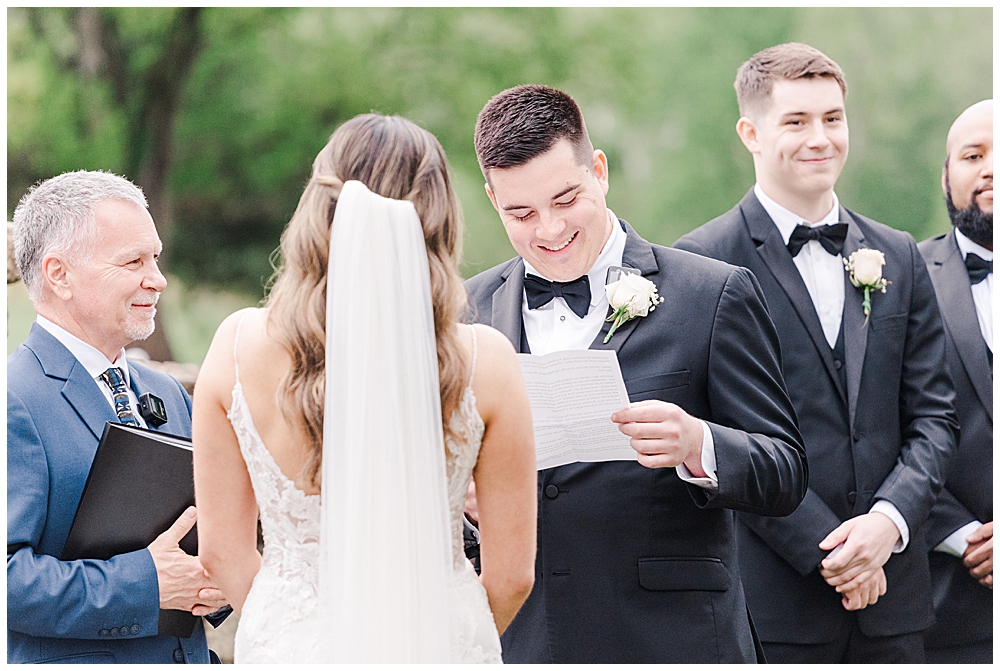 Outdoor ceremony at Evergreen Country Club wedding in spring | Northern VA Wedding Photographer