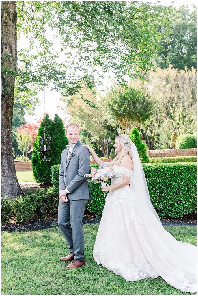 Private first look between bride and groom at fairytale-themed Historic Mankin Mansion wedding in June | Richmond wedding photographer