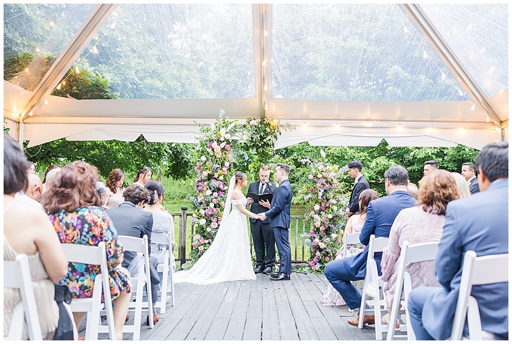 Tent covered ceremony at The Manor at Airmont wedding | Northern VA Wedding Photographer