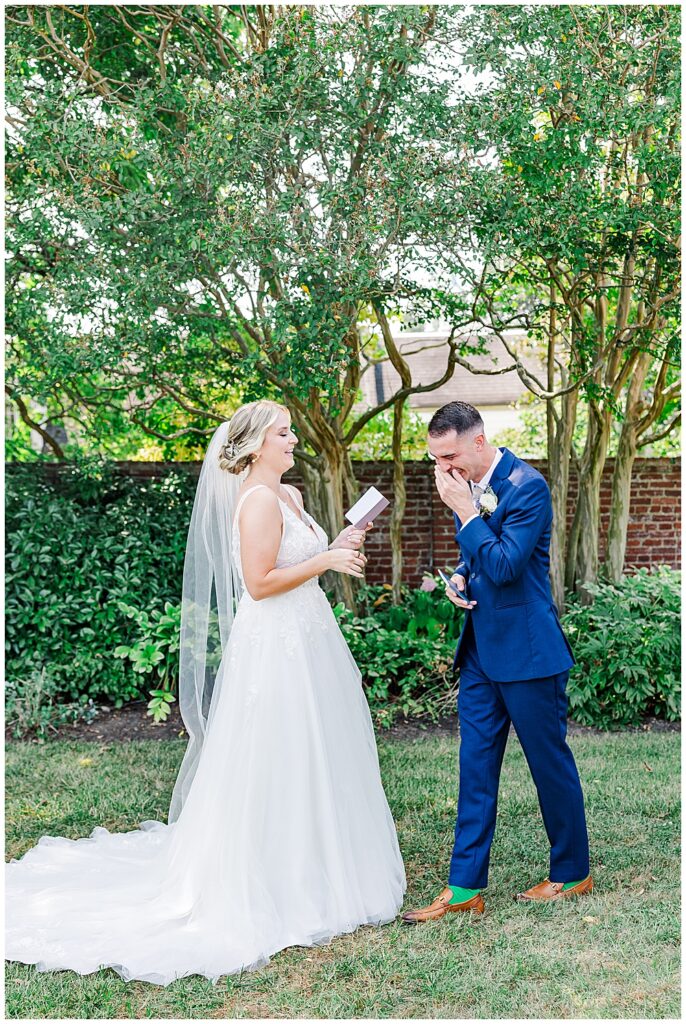 Candid moments of laughter between a bride and groom as they read their vows at their First Look on their wedding day

River Farm Wedding | Alexandria Wedding Photographer