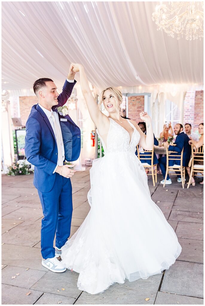 Bride and Groom's First Dance at tented outdoor wedding reception

River Farm Wedding | Alexandria Wedding Photographer