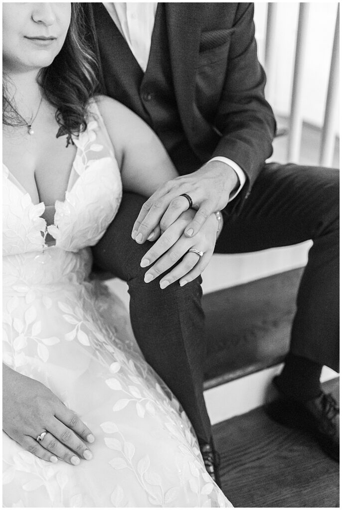 A black and white closeup photo of the bride and groom holding hands, their new wedding bands showing.

Rust Manor House Wedding | Leesburg Wedding Photography | VA Wedding Venues
